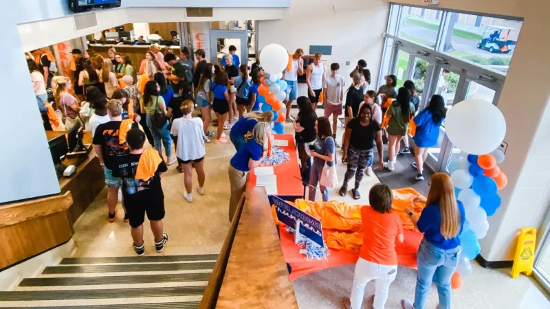 orientation entrance with students checking in