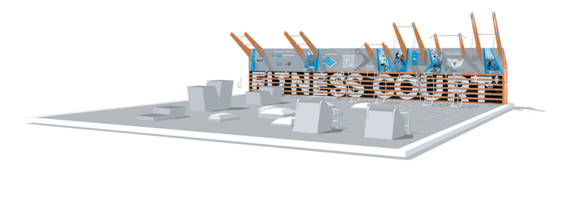 Outdoor fitness court with equipment, blue instruction panels, marked gray zones, and “FITNESS COURT” on the fence.