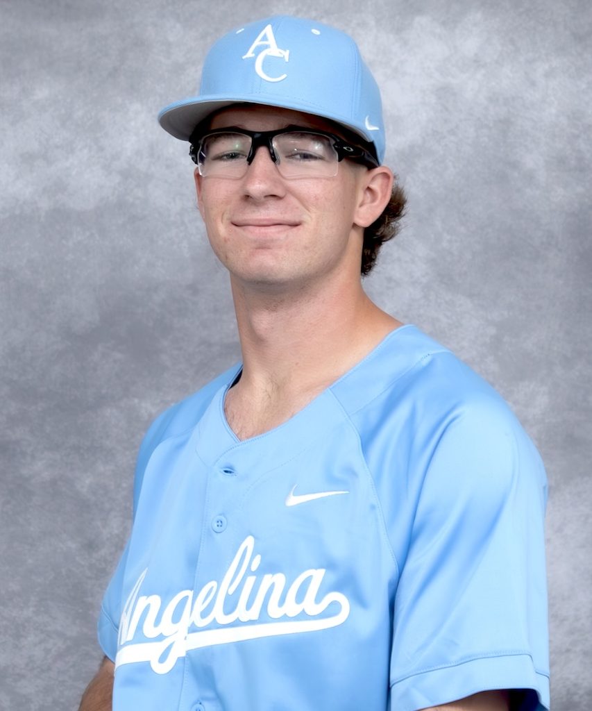 Young man in light blue Angelina baseball jersey and hat, short hair, glasses, standing before a gray background.
